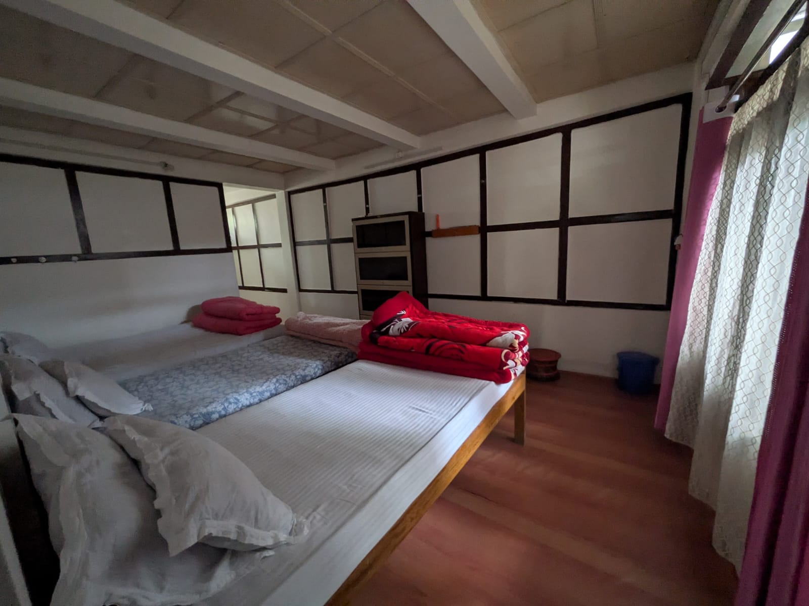 Room 3 from the side, still showing the extra bed that is being removed